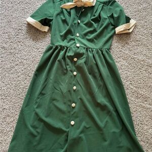 Elegant Green Dress with Cream Accents